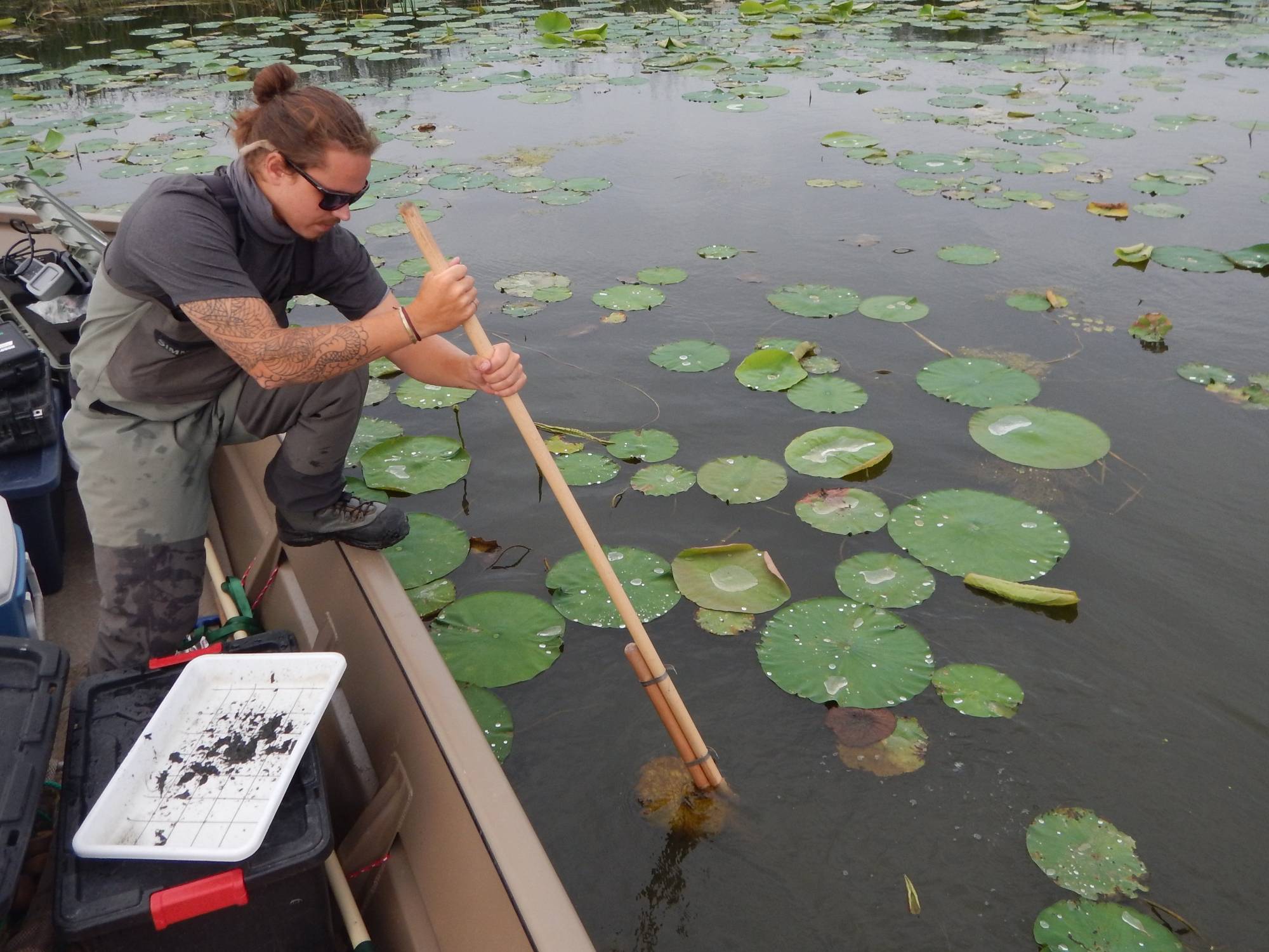 Zak collecting inverts.